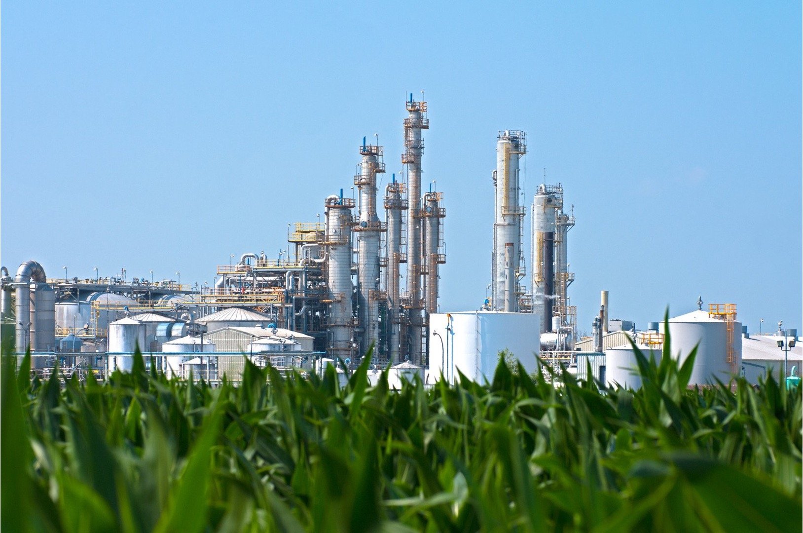 Ethanol plant by corn field